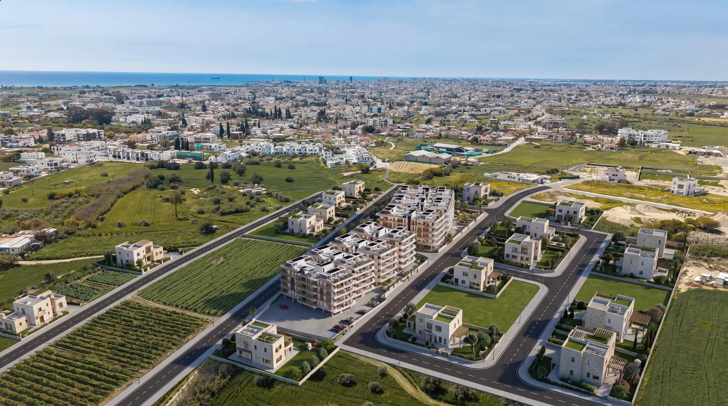 88 Residences from the air, with the fields and the sea beyond