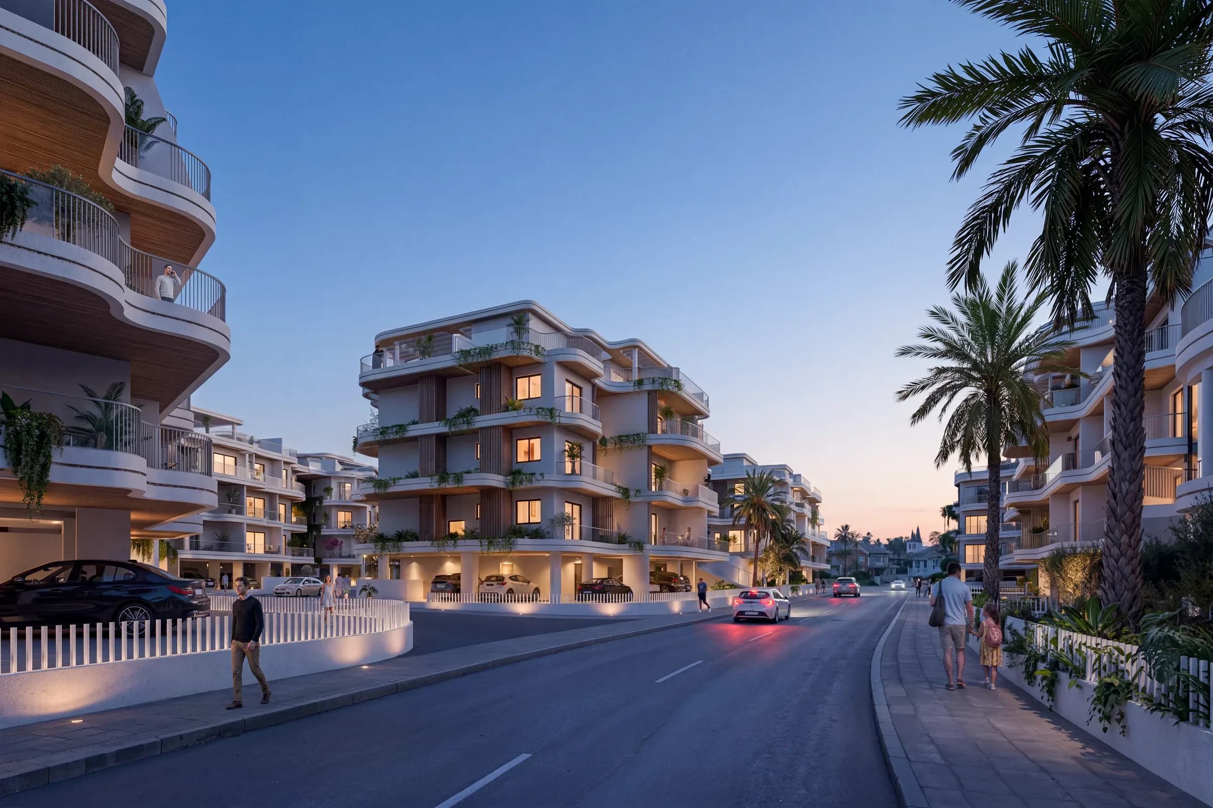 Zin Residences from the street at dusk, its windows lit