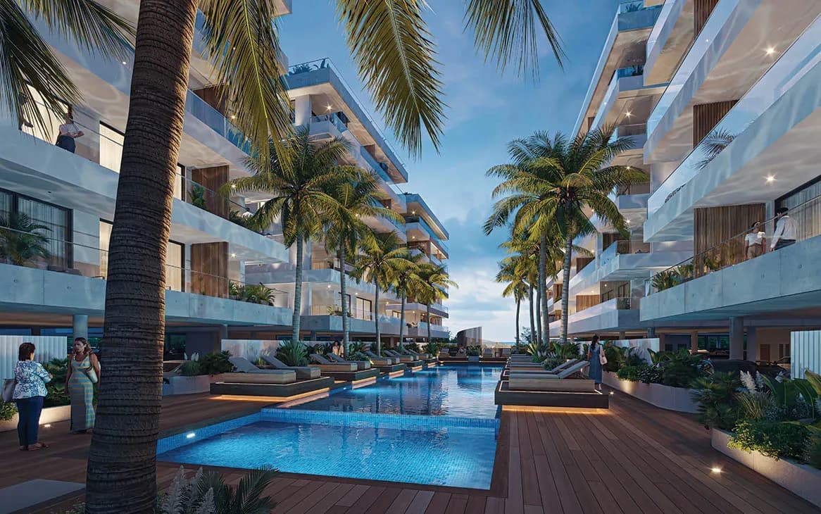 The pool and deck between the buildings at Luna Residences